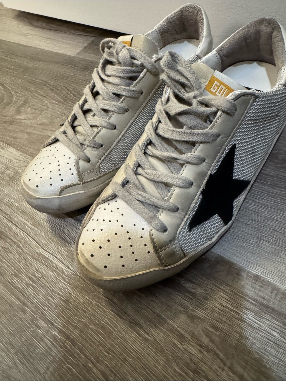 Golden Goose Women’s Super-Star sneakers in leather with mesh insert